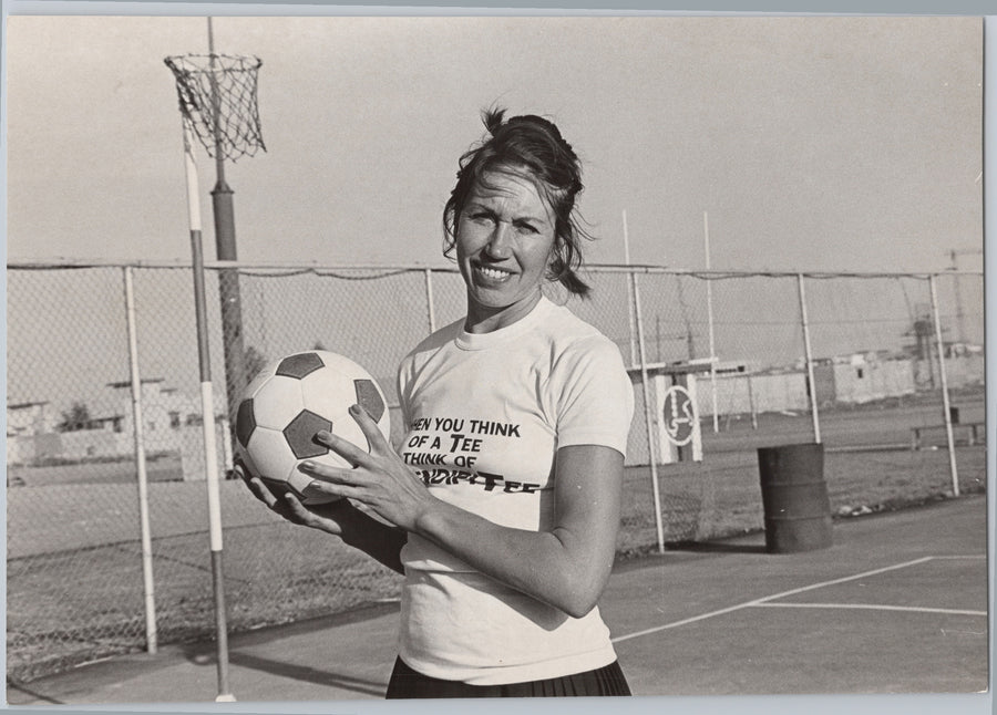 Judi Heath Holding a Football