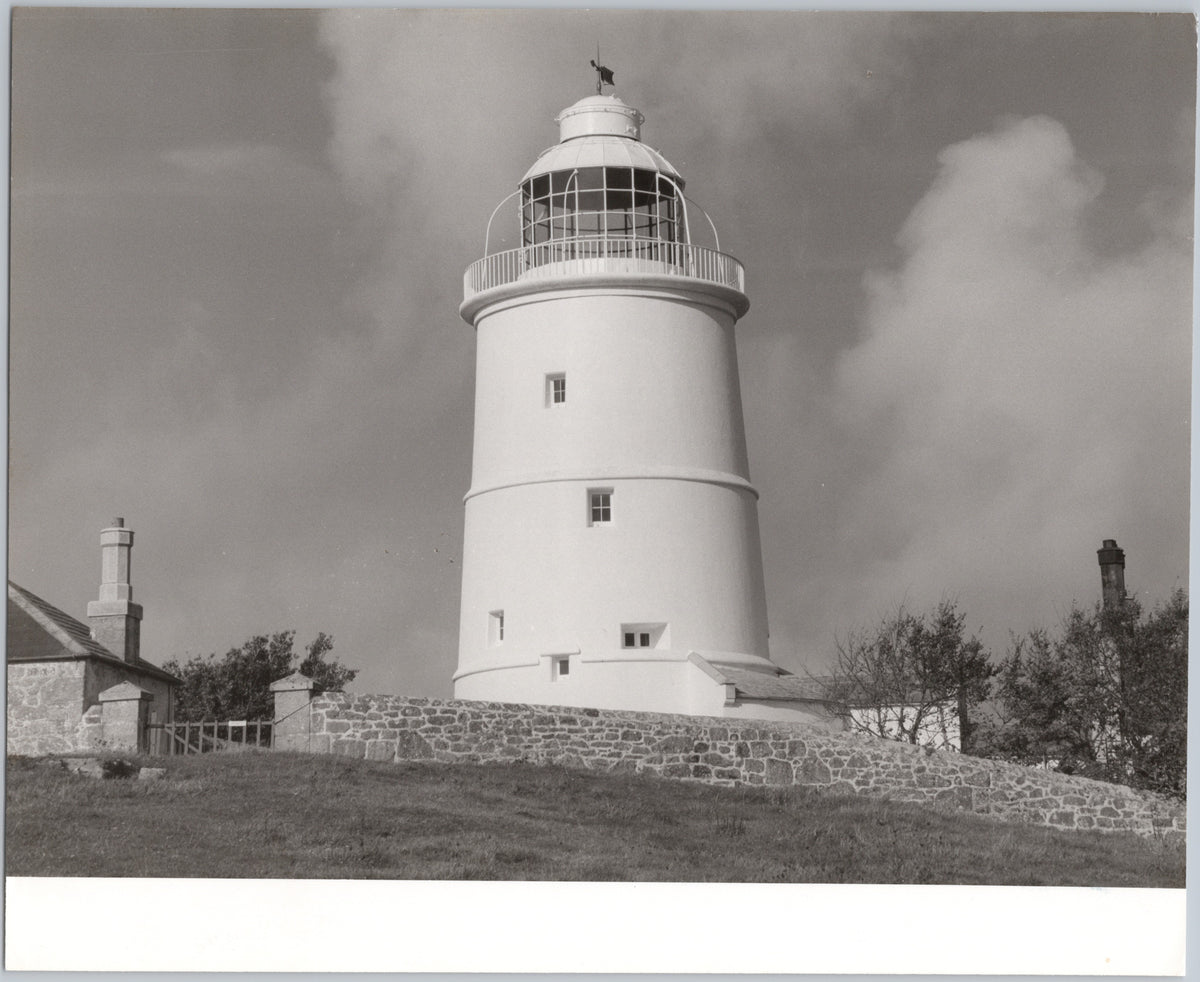 White Lighthouse and Stone Wall — front