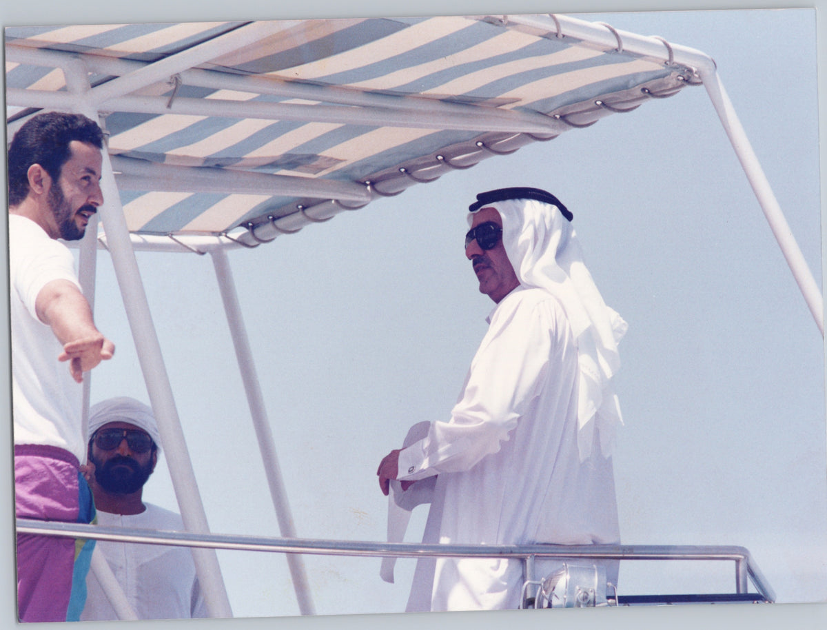 Men Talking on a Boat Deck — front