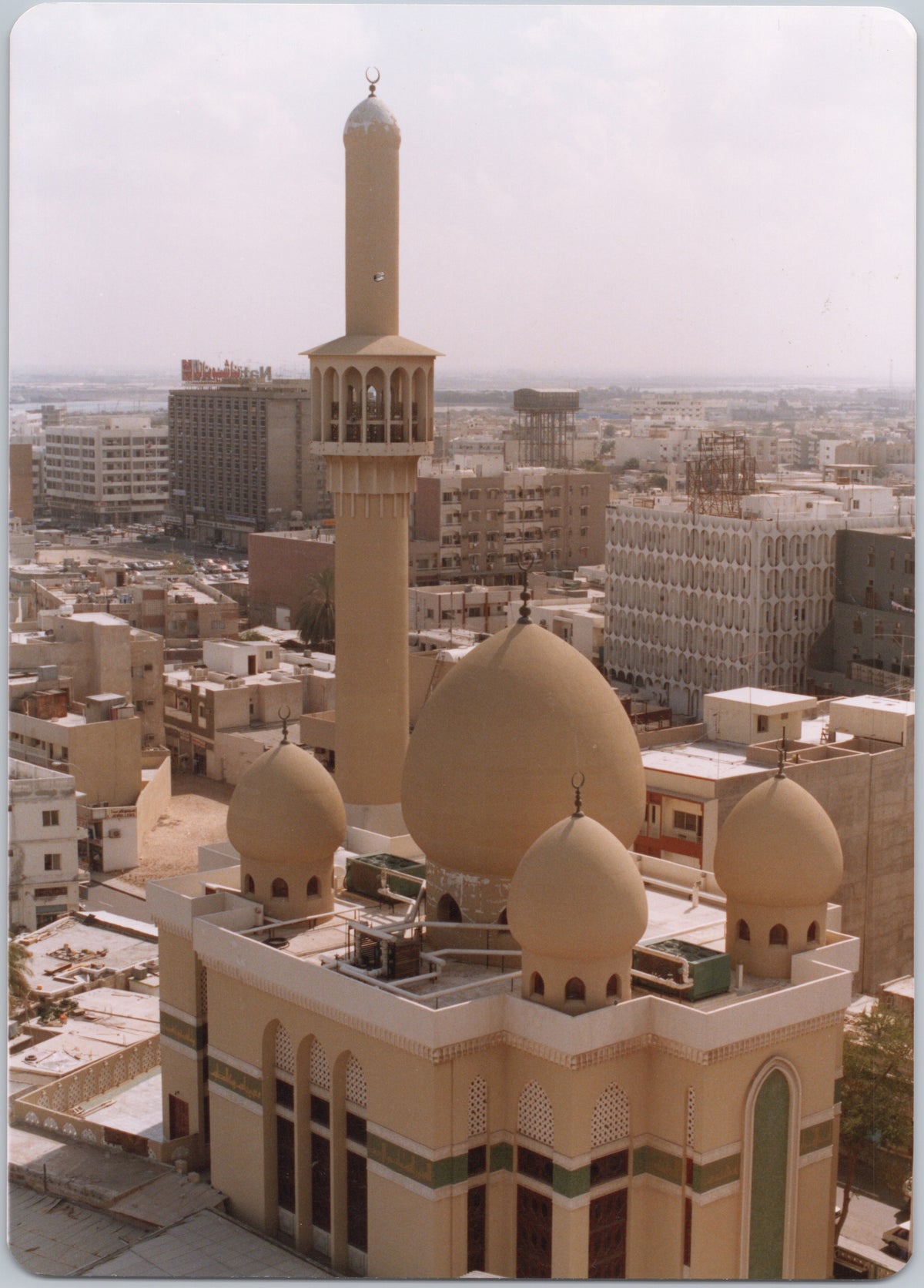 Mosque Domes and Minaret above the City — front