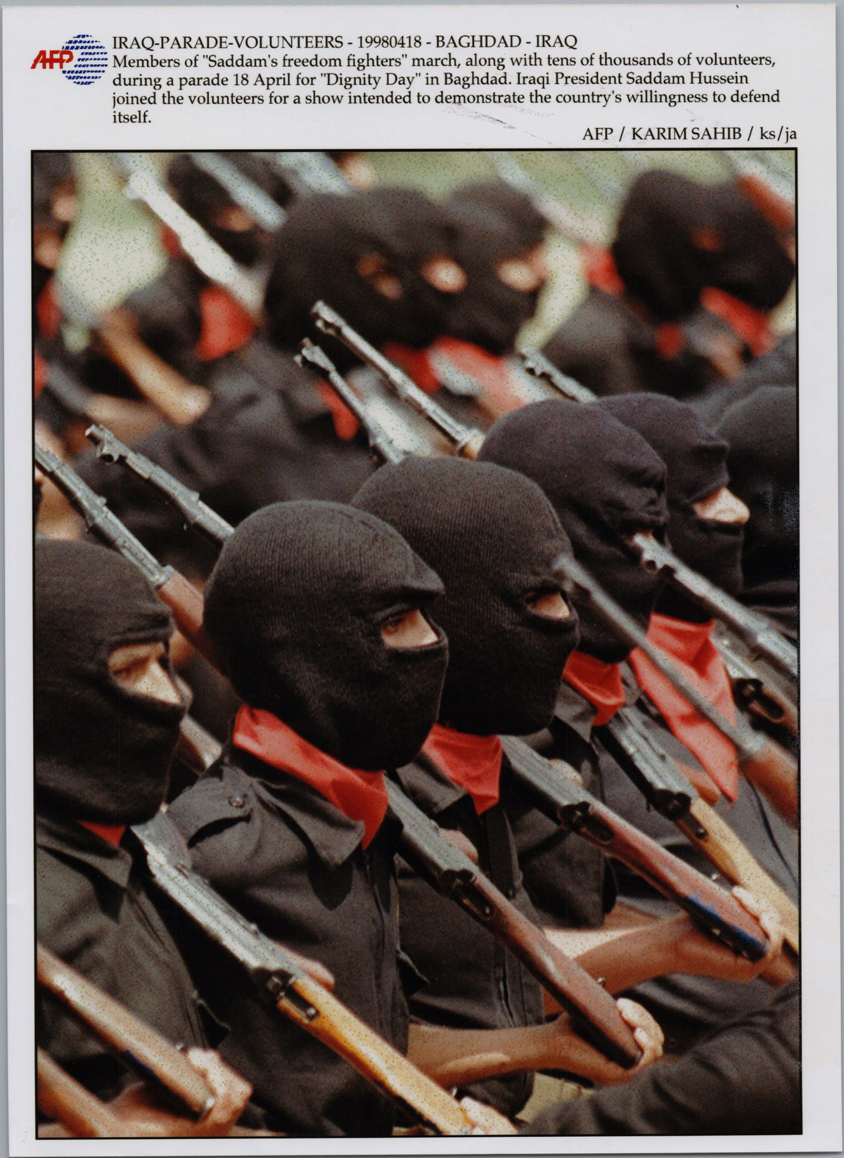 Masked Volunteers at Baghdad's Dignity Day Parade — 1998 — front
