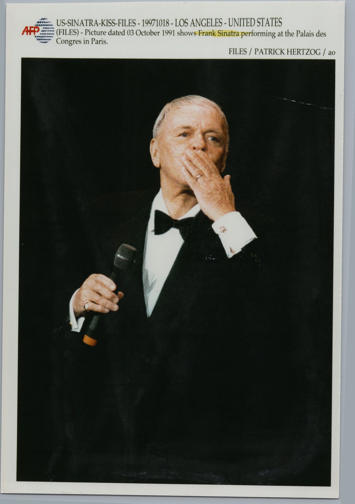 Frank Sinatra Blows a Kiss on Stage in Paris — 1991 — front