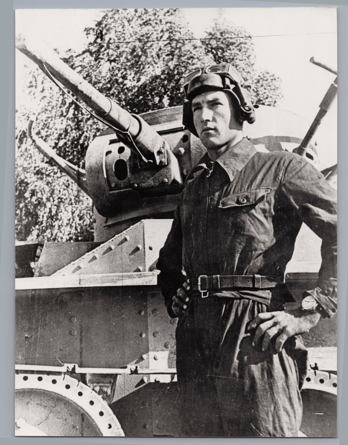 Man in Uniform Beside an Armoured Vehicle — front