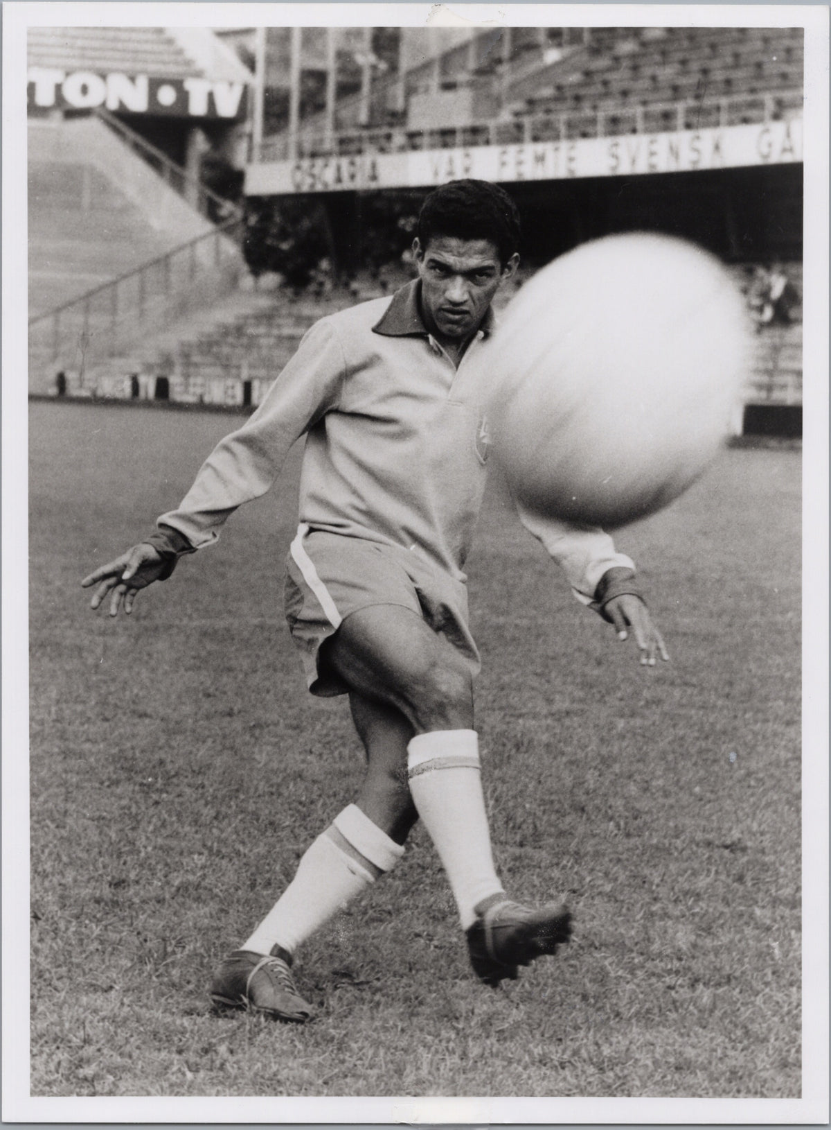 Garrincha Practising with a Football — front