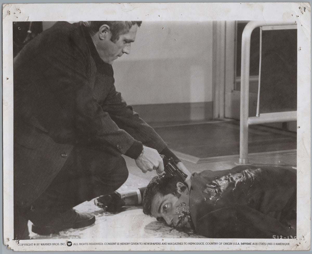 Film Scene — Man Crouching beside a Fallen Figure — front