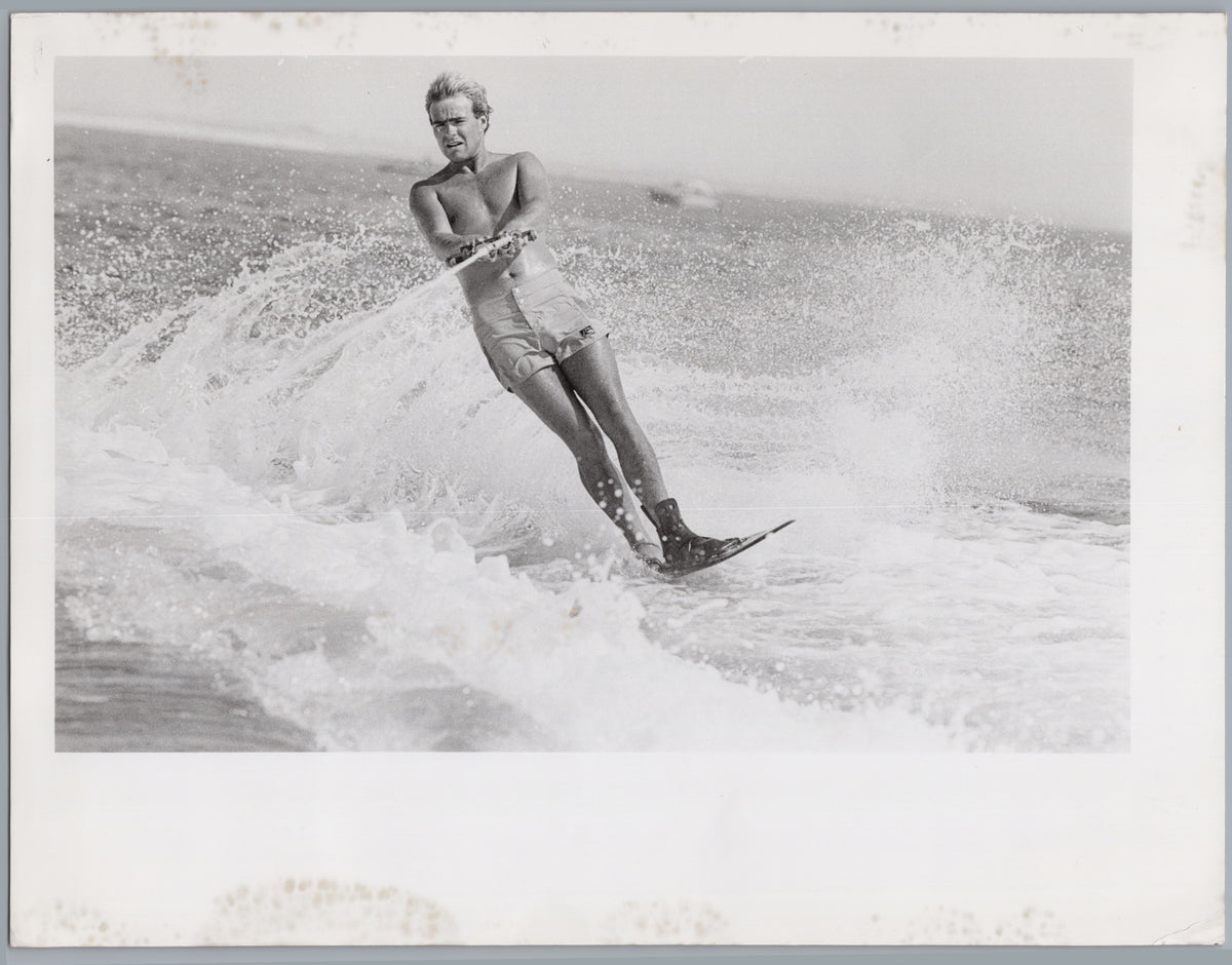 Water-Skier Cutting Through Spray — front