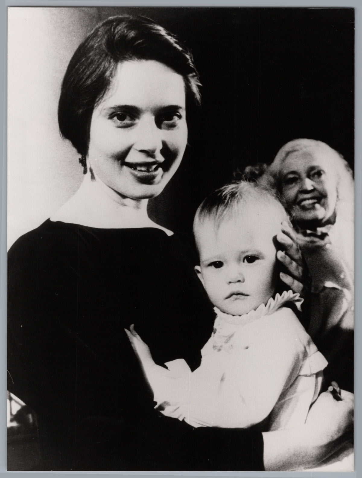 Woman Holding a Child and a Doll — front