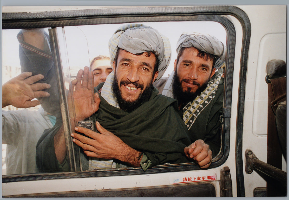 Men at a Bus Window — Colour Scene — front