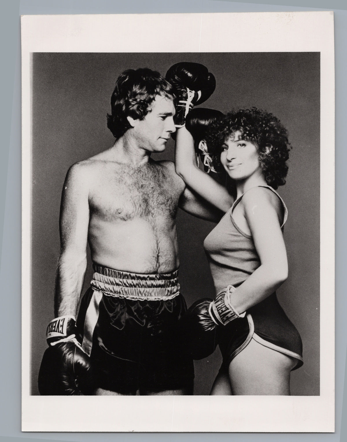 Barbra Streisand and Ryan O'Neal — Boxing Gloves Pose — front