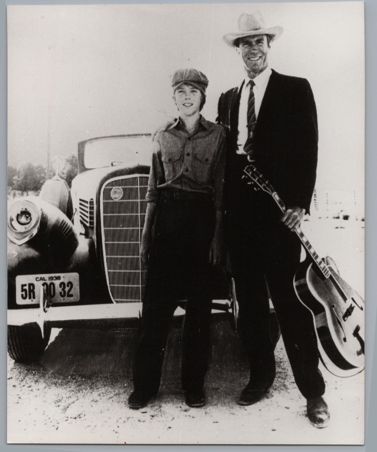 Clint Eastwood — Guitar and Vintage Car Scene — front