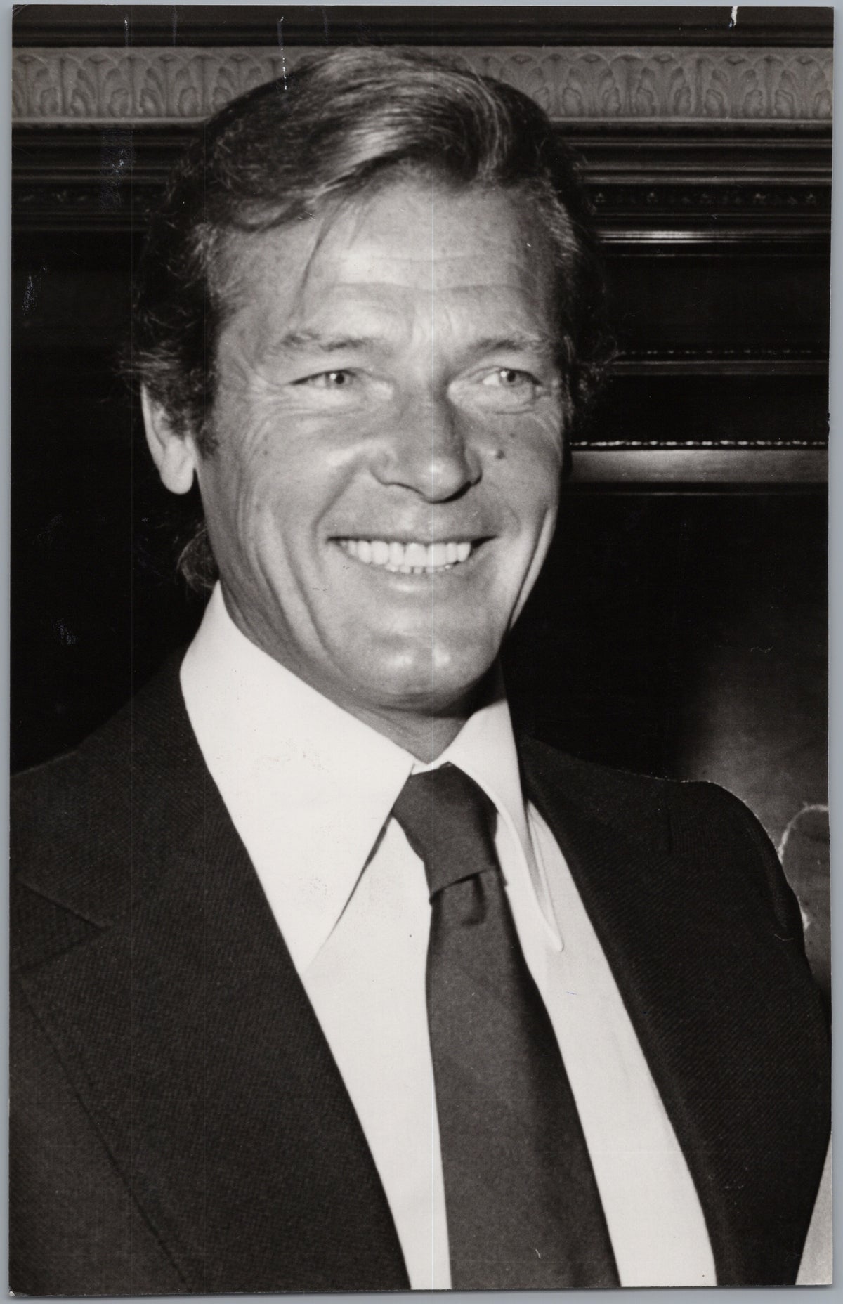 Smiling Man in a Suit — Editorial Portrait — front