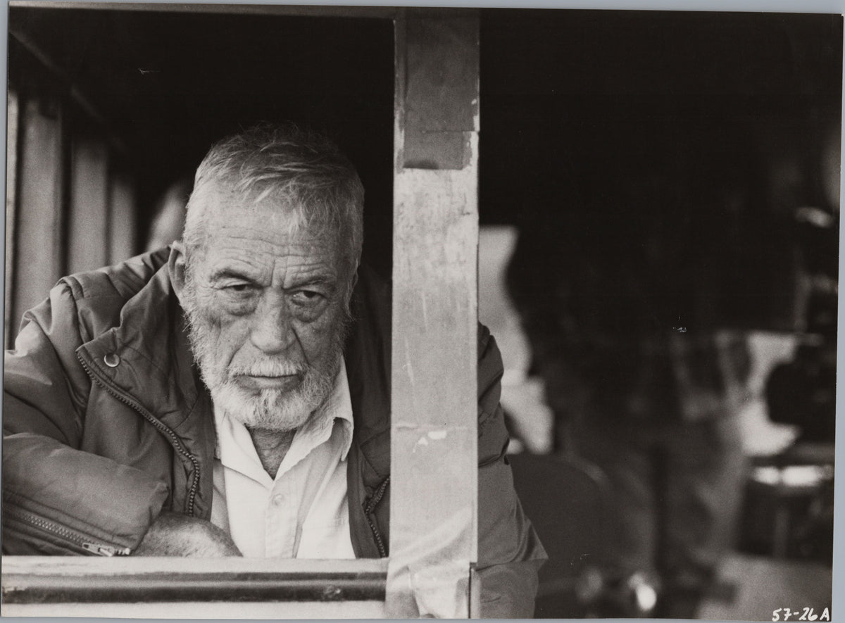 Man Leaning at an Open Window — A01016