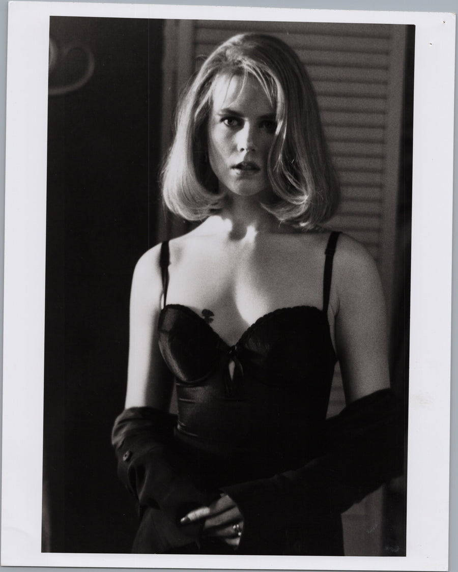 Woman in a Dark Evening Outfit