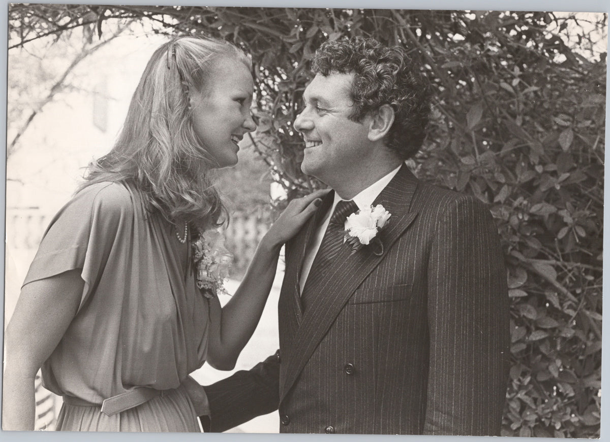 Wedding Couple with a Buttonhole Flower — front