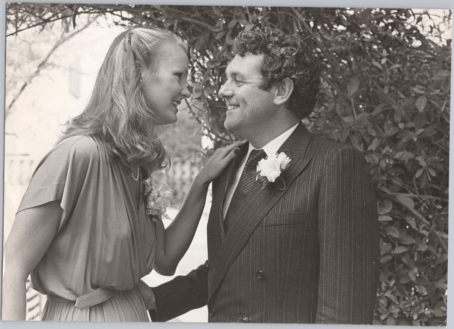 Wedding Couple with a Buttonhole Flower