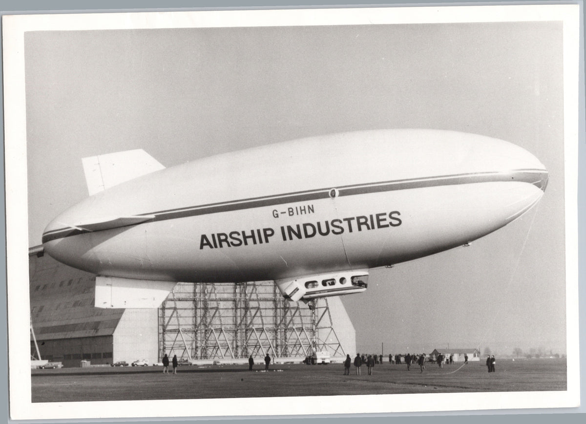 Airship Industries Blimp Above an Airfield — front