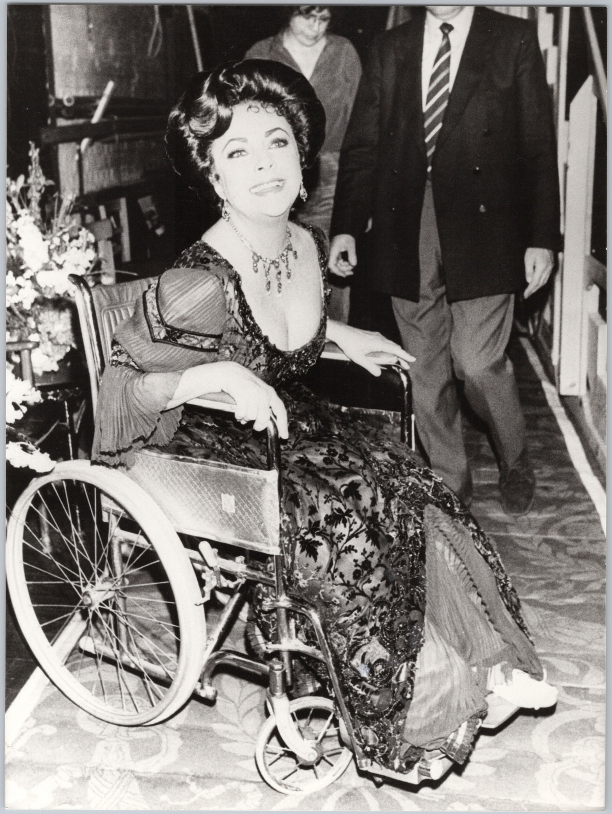 Woman in an Evening Gown Seated in a Wheelchair — front
