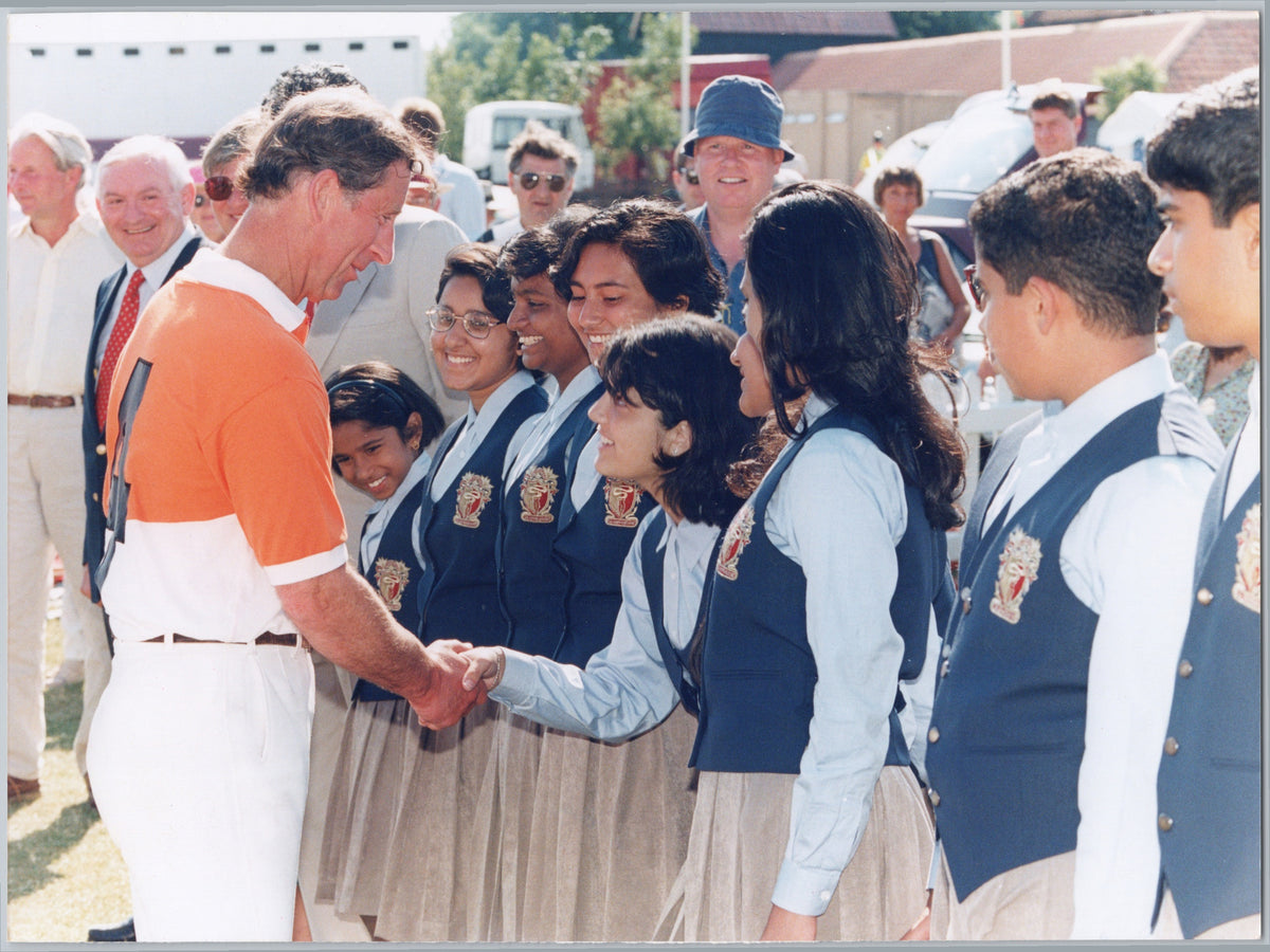 Prince Charles Greeting Students at a Polo Match — front