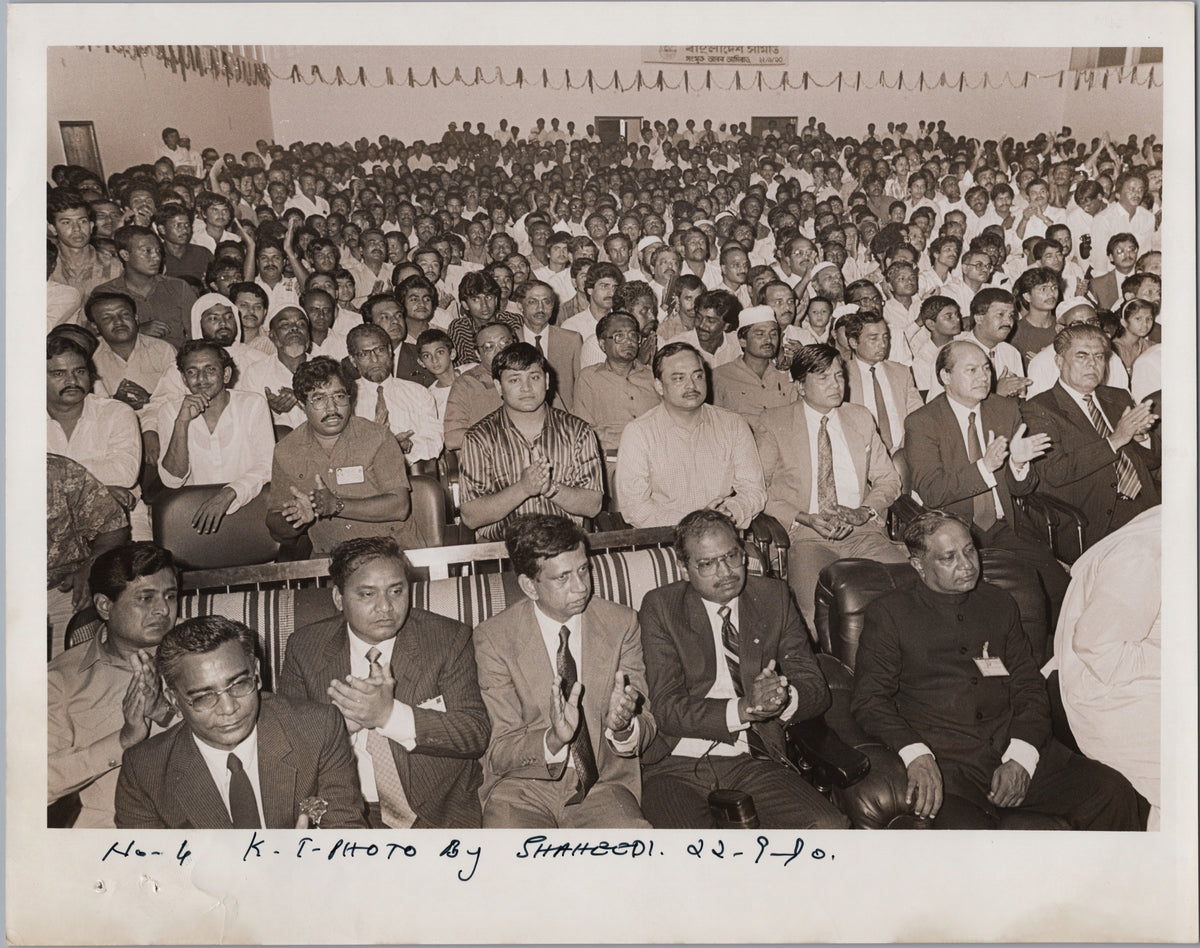 Crowded Hall with an Applauding Audience — front