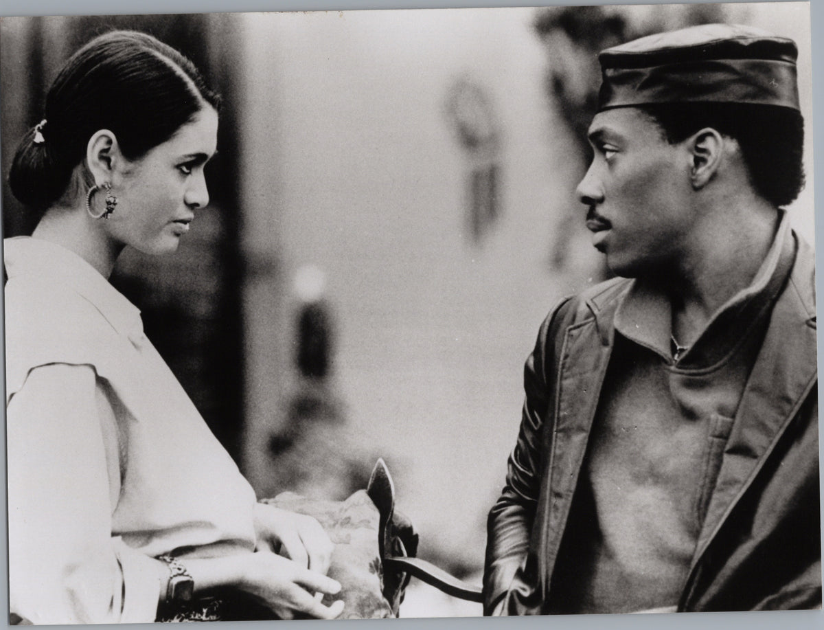 Woman and Man in a Military-Style Cap — front