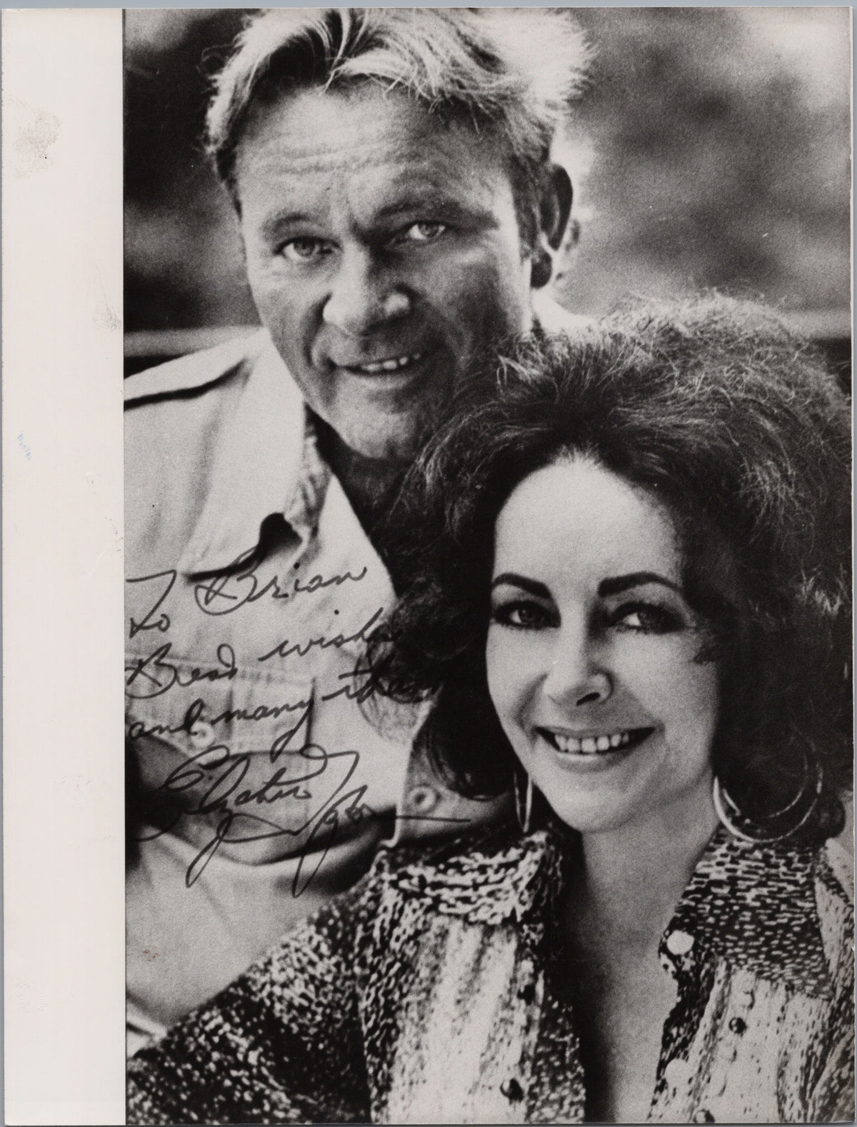 Elizabeth Taylor with a Male Companion — front