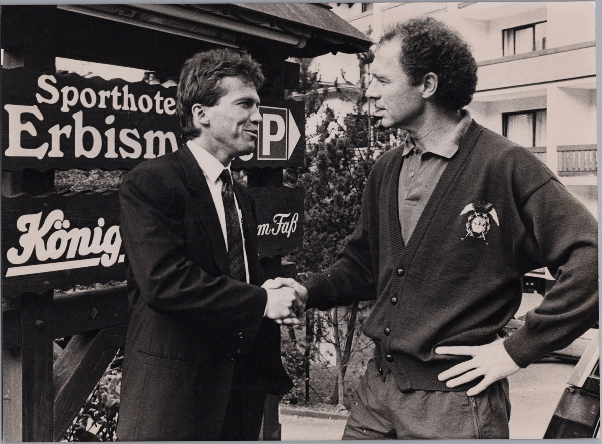 Lothar Matthäus and Franz Beckenbauer Shaking Hands — front