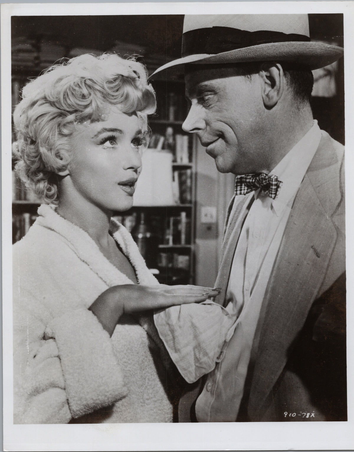 Woman and Man in a Fedora — Interior Film Scene — front