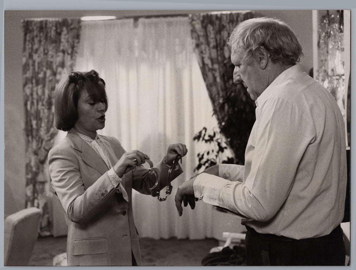 Two Characters Sharing an Interior Scene — front