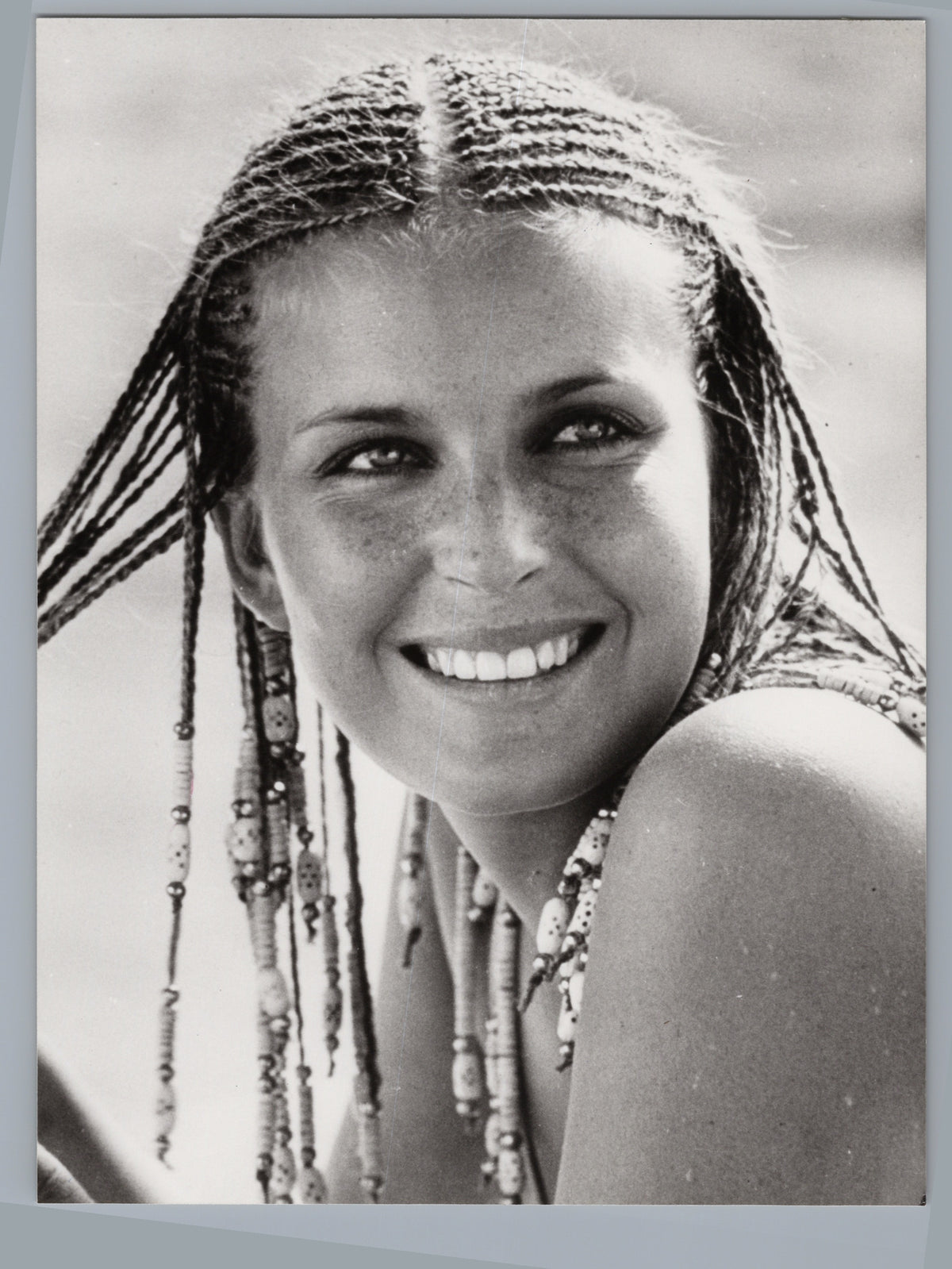 Bo Derek — Smiling Portrait with Braided Hair — front